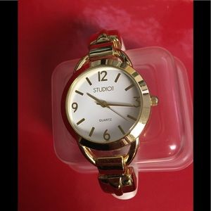 Gold Tone Fashion Cuff Quartz Bracelet Watch.